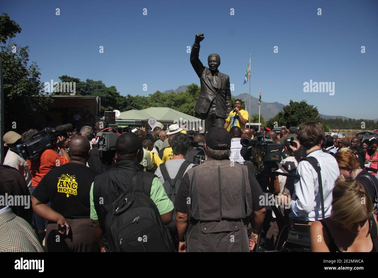 Journalists are surrounding the ANC leaders and a statue of Nelson Mandela during the 20th anniversary of Madiba’s release, in front of the Drakenstein Prison, where, on the morning of the 11th of february 2010, a symbolic walk gathered some of the South-Africa’s most prominent anti-apartheid joined hundreds of people, 70km from Cape Town, South Africa. Photo by Nathalie Gros/ABACAPRESS.COM Stock Photo