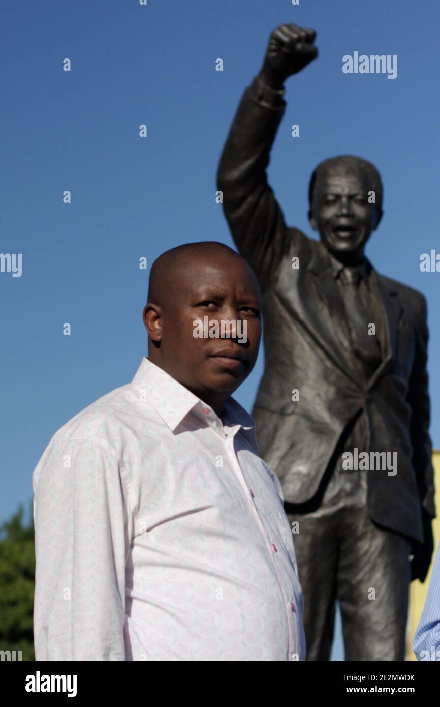 Julius Malema, the president of the African National Congress Youth League, is standing in front of a statue of Nelson Mandela, during the celebration of the 20th anniversary of Madiba’s release, in front of the Drakenstein Prison, where, on the morning of the 11th of february 2010, a symbolic walk gathered some of the South-Africa’s most prominent anti-apartheid joined hundreds of people, 70km from Cape Town, South Africa. Photo by Nathalie Gros/ABACAPRESS.COM Stock Photo