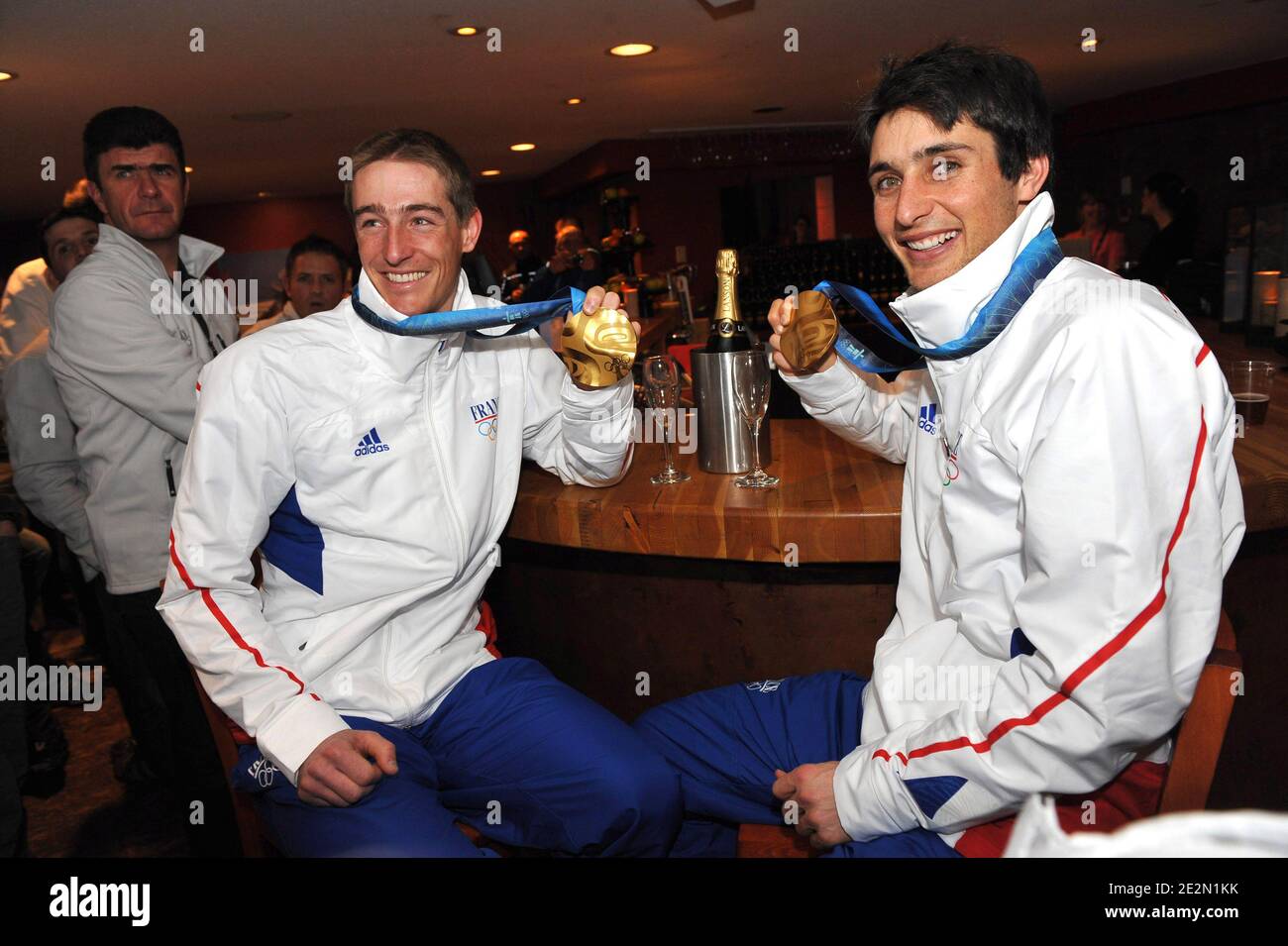 France's Vincent Jay and Jason Lamy Chappuis celebrate with their gold medals at the club France during the Vancouver 2010 XXI Olympic Winter Games in Whistler, Canada on February 14, 2010. Photo by Gouhier-Hahn-Nebinger/ABACAPRESS.COM Stock Photo