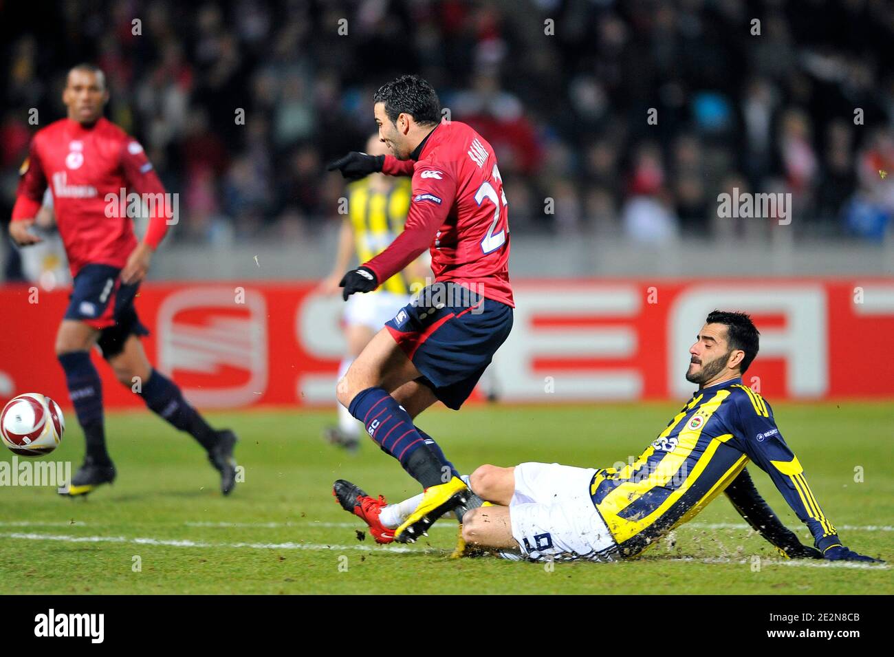 Lille's Adil Rami and Fenerbahce's Daniel Guiza during the UEFA Europa League soccer match, LOSC Lille Metropole vs Fenerbahce SK at the Stadium Nord in Villeneuve d'Ascq, France on February 18, 2010. Lille won 2-1. Photo by Stephane Reix/ABACAPRESS.COM Stock Photo