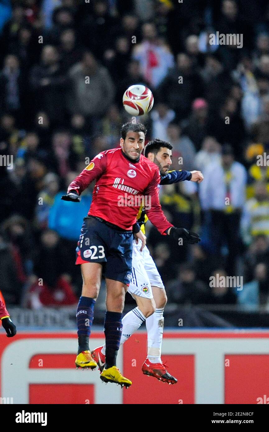 Lille's Adil Rami and Fenerbahce's Daniel Guiza during the UEFA Europa League soccer match, LOSC Lille Metropole vs Fenerbahce SK at the Stadium Nord in Villeneuve d'Ascq, France on February 18, 2010. Lille won 2-1. Photo by Stephane Reix/ABACAPRESS.COM Stock Photo