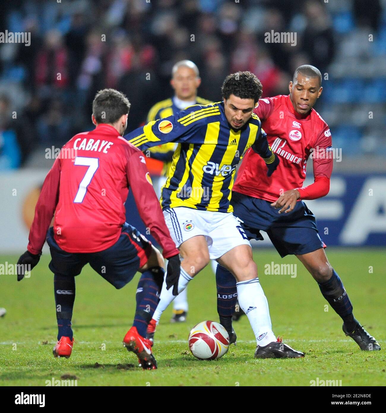Lille's Yohan Cabaye, Emerson and Fenerbahce's Mehmet Topuz during the UEFA Europa League soccer match, LOSC Lille Metropole vs Fenerbahce SK at the Stadium Nord in Villeneuve d'Ascq, France on February 18, 2010. Lille won 2-1. Photo by Stephane Reix/ABACAPRESS.COM Stock Photo