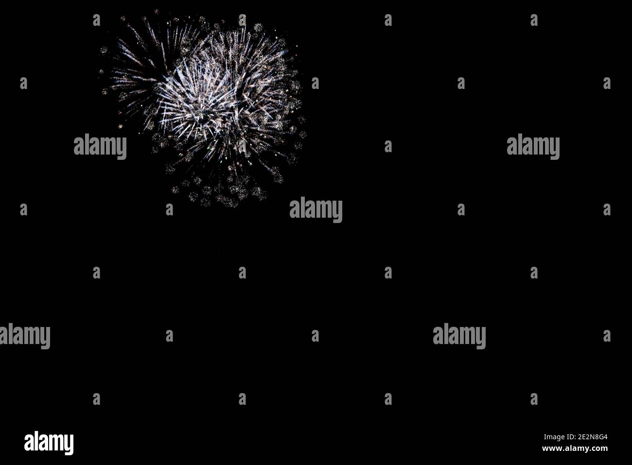 fireworks in white color black sky with copy space Stock Photo