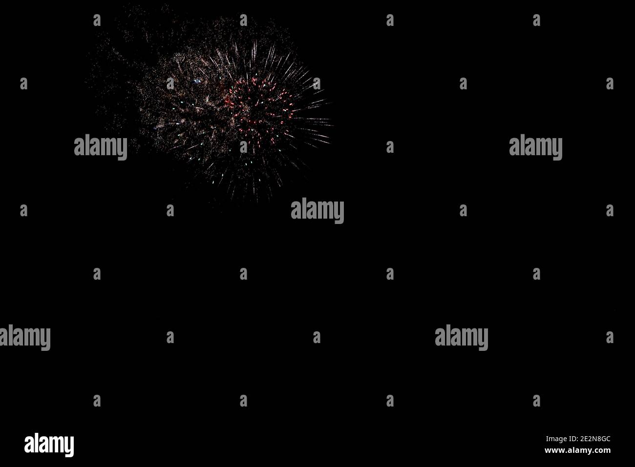 fireworks in white color and red point black sky with copy space Stock Photo