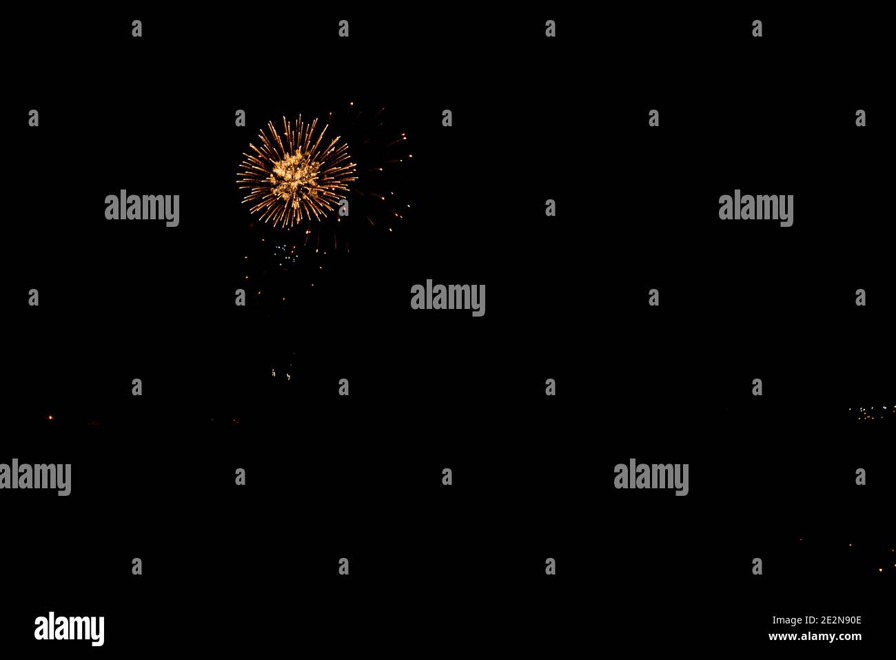 fireworks in orange color black sky with copy space Stock Photo