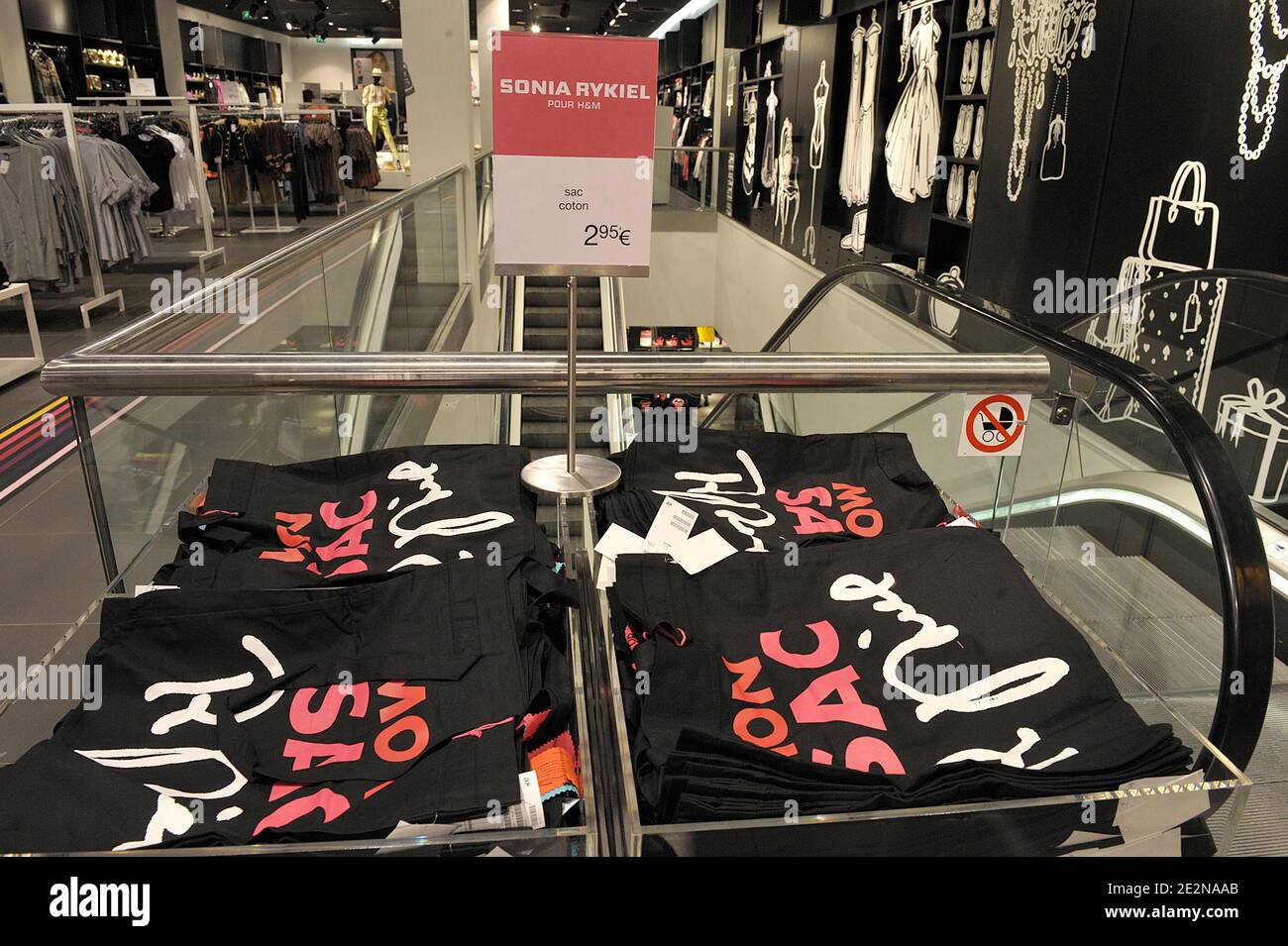 People rush to get clothes in a H&M store stocking the new collection  designed by French designer Sonia Rykiel for H&M. Rykiel's line for H&M,  launched today in several stores, starts at