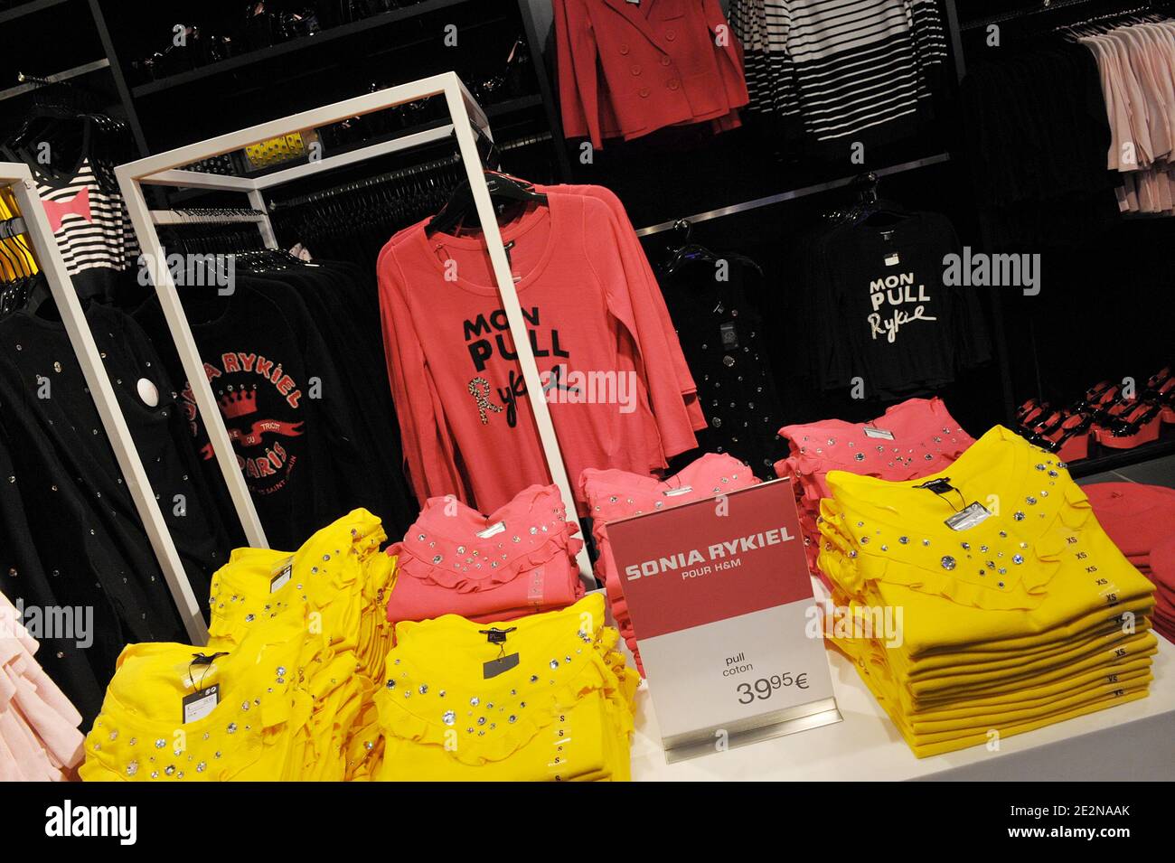 People rush to get clothes in a H&M store stocking the new collection  designed by French designer Sonia Rykiel for H&M. Rykiel's line for H&M,  launched today in several stores, starts at