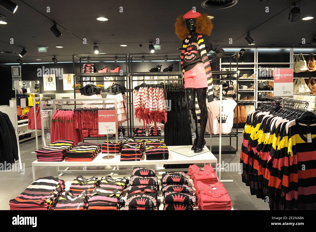 People rush to get clothes in a H&M store stocking the new collection  designed by French designer Sonia Rykiel for H&M. Rykiel's line for H&M,  launched today in several stores, starts at