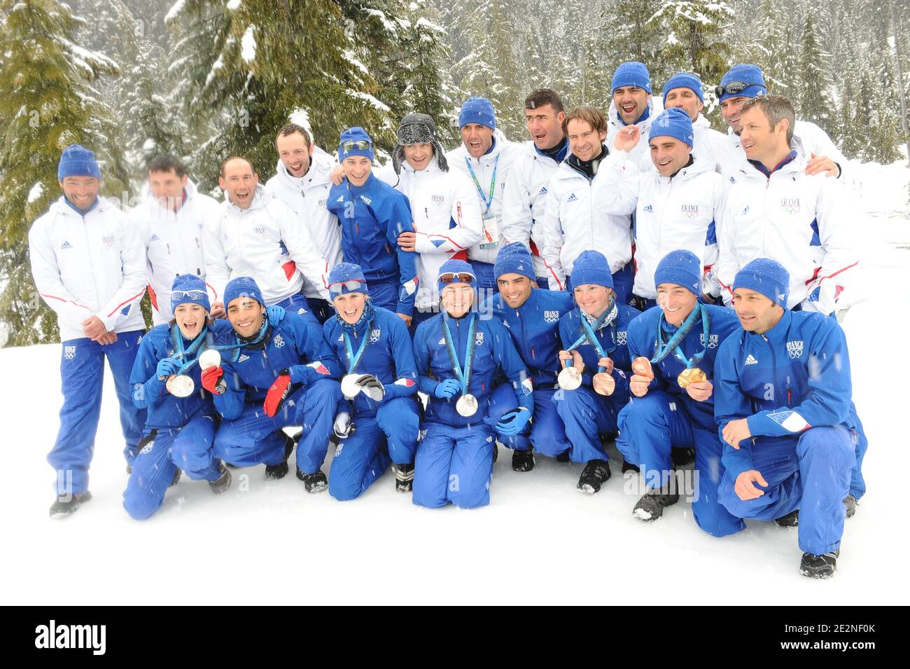 France's Biathlon team and coaches pose with their medals after the last Biathlon competition for the Vancouver 2010 XXI Olympic Winter Games at Olympic Park in Whistler, Canada on February 26, 2010. Photo by Gouhier-Hahn-Nebinger/ABACAPRESS.COM Stock Photo