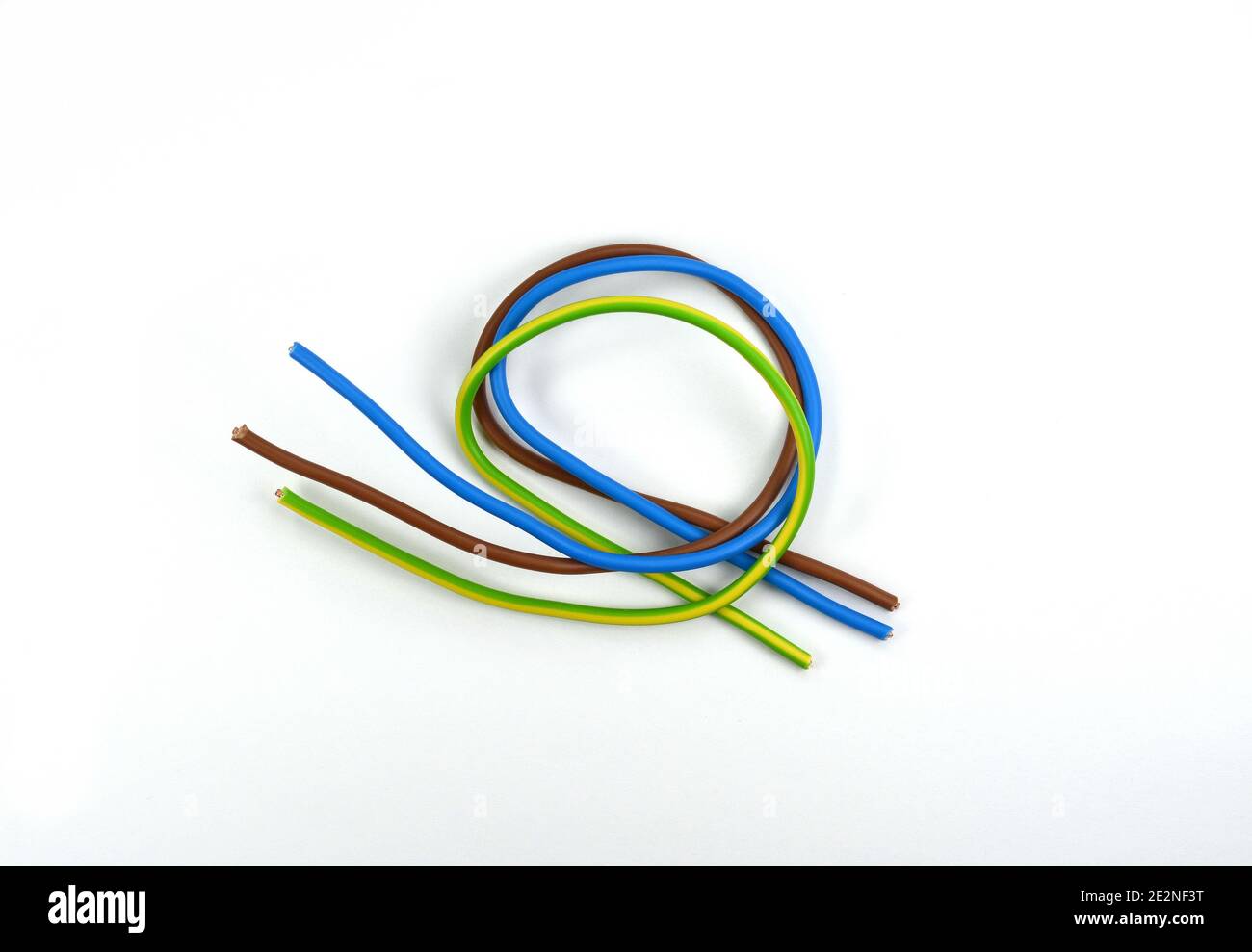 Electric cable isolated on a white background Stock Photo - Alamy