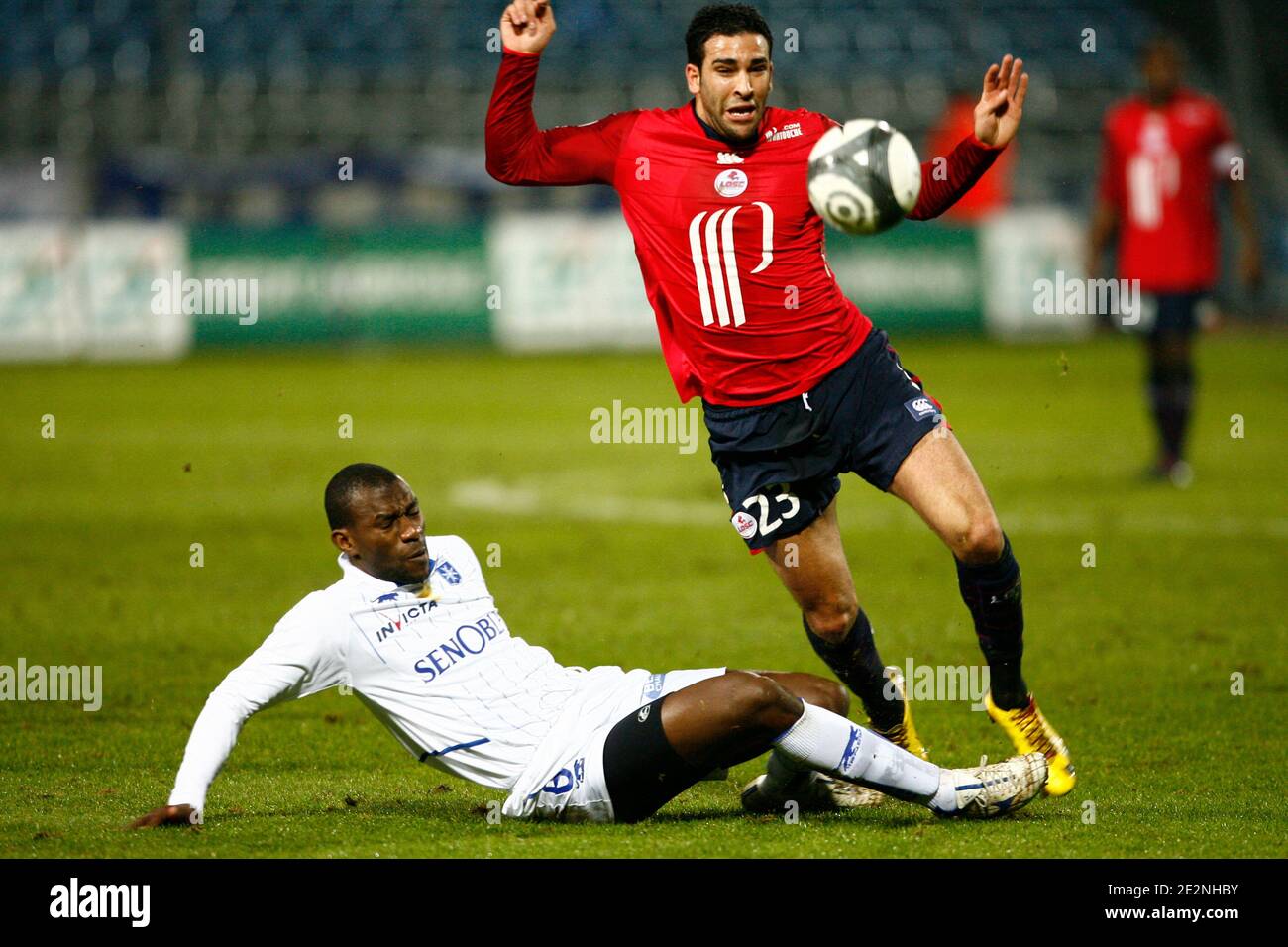 Lille's Adil Rami fights for the ball with Auxerre's Adama Coulibaly during  French First League soccer match, Lille vs AJ Auxerre at Stadium Lille  Metropole in Lille, France on Febuary 28, 2010.