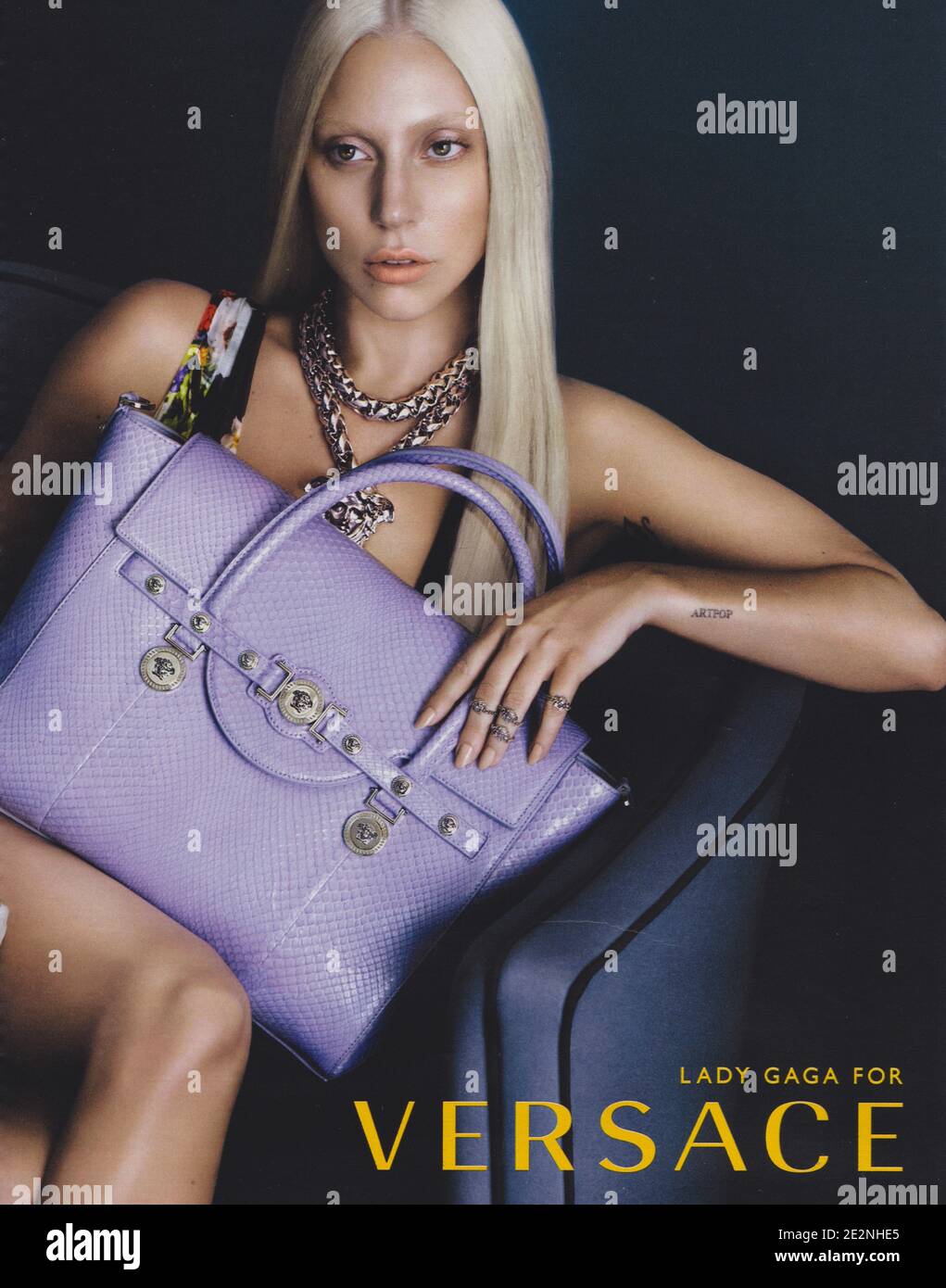 poster advertising VERSACE fashion house with Lady Gaga in paper magazine  from 2014 year, advertisement, creative VERSACE advert from 2010s Stock  Photo - Alamy