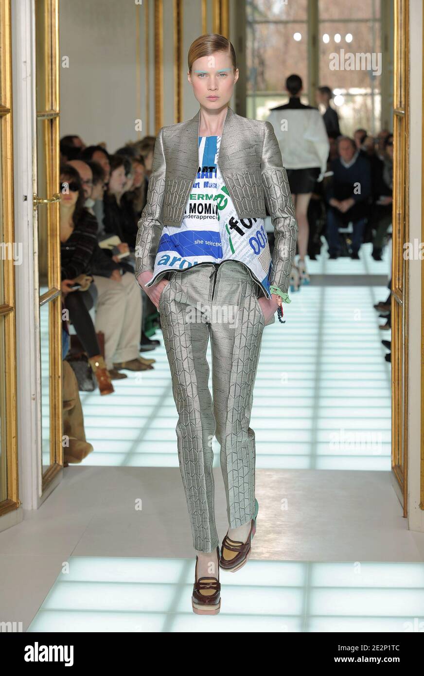 A model displays a creation for Balenciaga Fall-Winter 2010/2011  ready-to-wear collection show held at the Hotel Crillon in Paris, France on  March 4, 2010. Photo by Alain Gil-Gonzalez/ABACAPRESS.COM Stock Photo -  Alamy