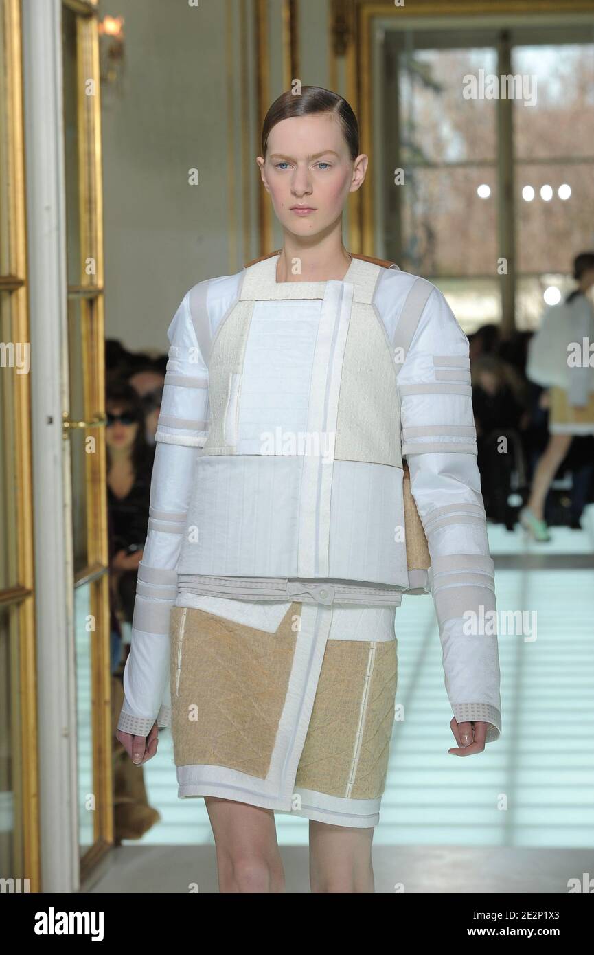 Model Carla Gebhart displays a creation for Balenciaga Fall-Winter  2010/2011 ready-to-wear collection show held at the Hotel Crillon in Paris,  France on March 4, 2010. Photo by Alain Gil-Gonzalez/ABACAPRESS.COM Stock  Photo -