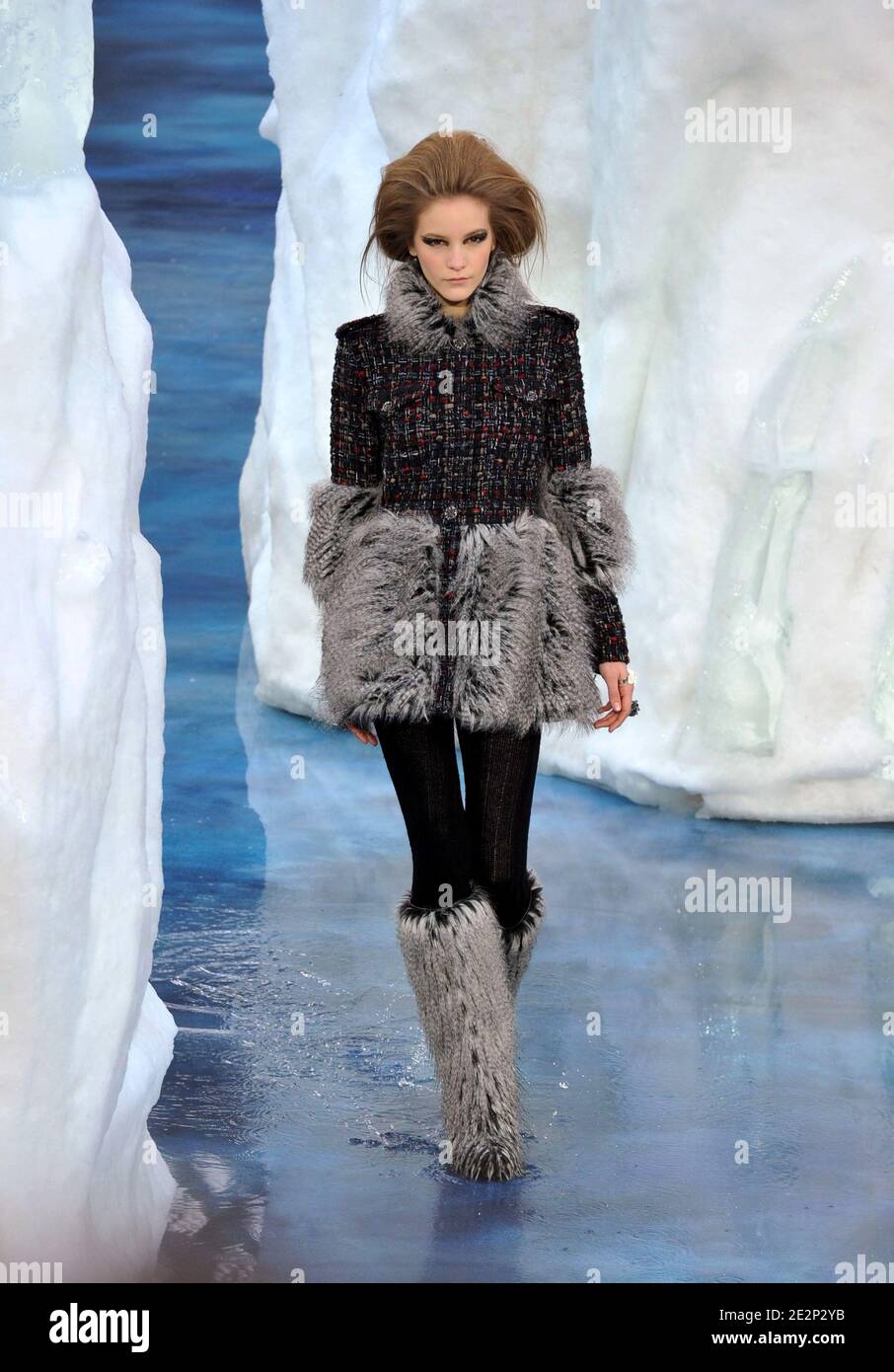 A model displays a creation by designer Karl Lagerfeld for Chanel Fall-Winter  2010/2011 ready