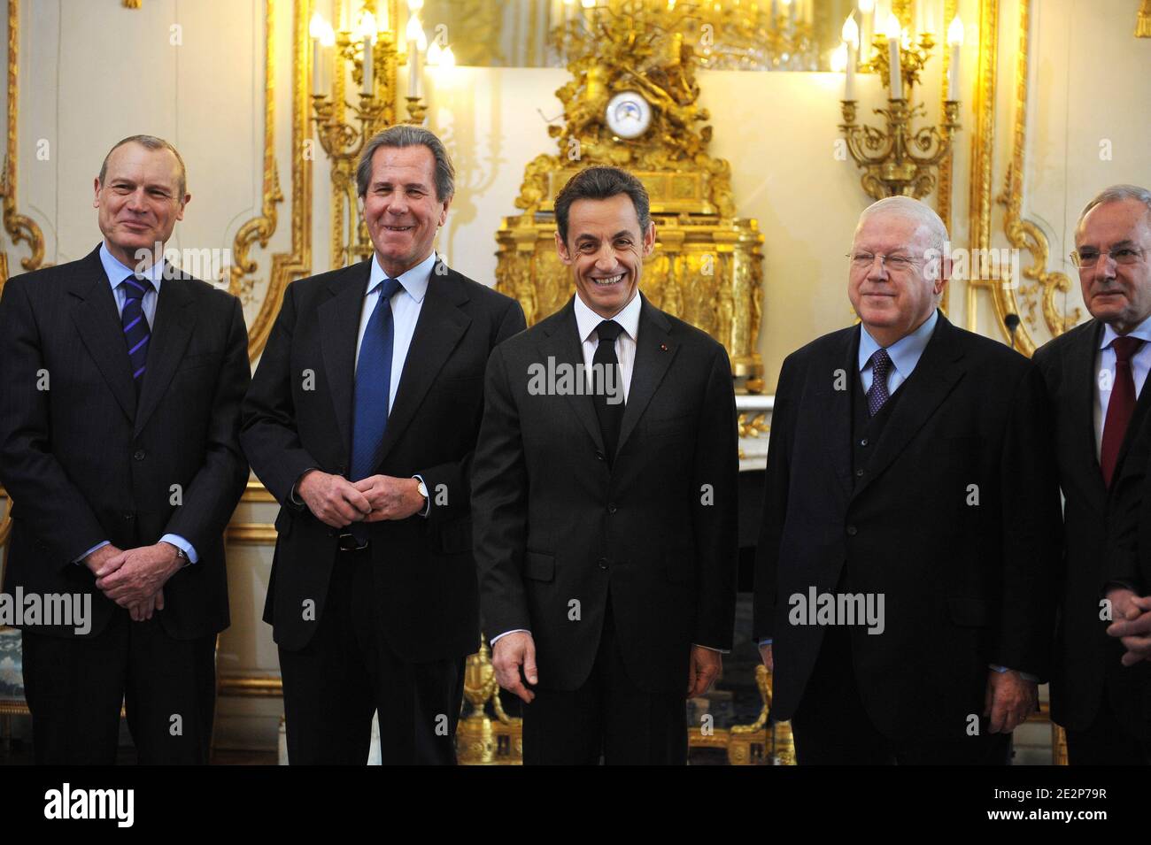 French member of the Constitutional Council Pierre Steinmetz, President of  the Constitutional Council Jean-Louis Debre, President Nicolas Sarkozy,  newly-named members of the Constitutional Council Michel Charasse and  Jacques Barrot are pictured during