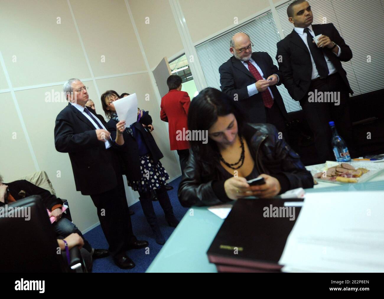 Jean-Paul Huchon, outgoing president of the Regional Council of Ile de France, and candidate to his own succession looks at the estimates as he waits the results of the first round of the regional elections and near Robert Hue and Abdelhak Kachouri in Paris, France on March 14, 2010. Photo by Mousse/ABACAPRESS.COM Stock Photo