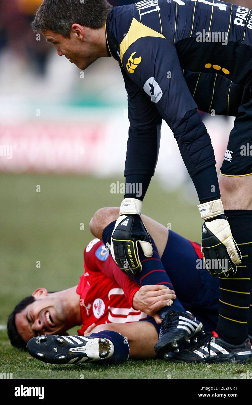 Lille's Ricardo Costa is hurt during the French First League soccer match, Lille OSC vs Grenoble F38 at Lille Metropole Stadium in Lille, France on March 14, 2010. Lille won 1-0. Photo by Mikael LIbert/ABACAPRESS.COM Stock Photo