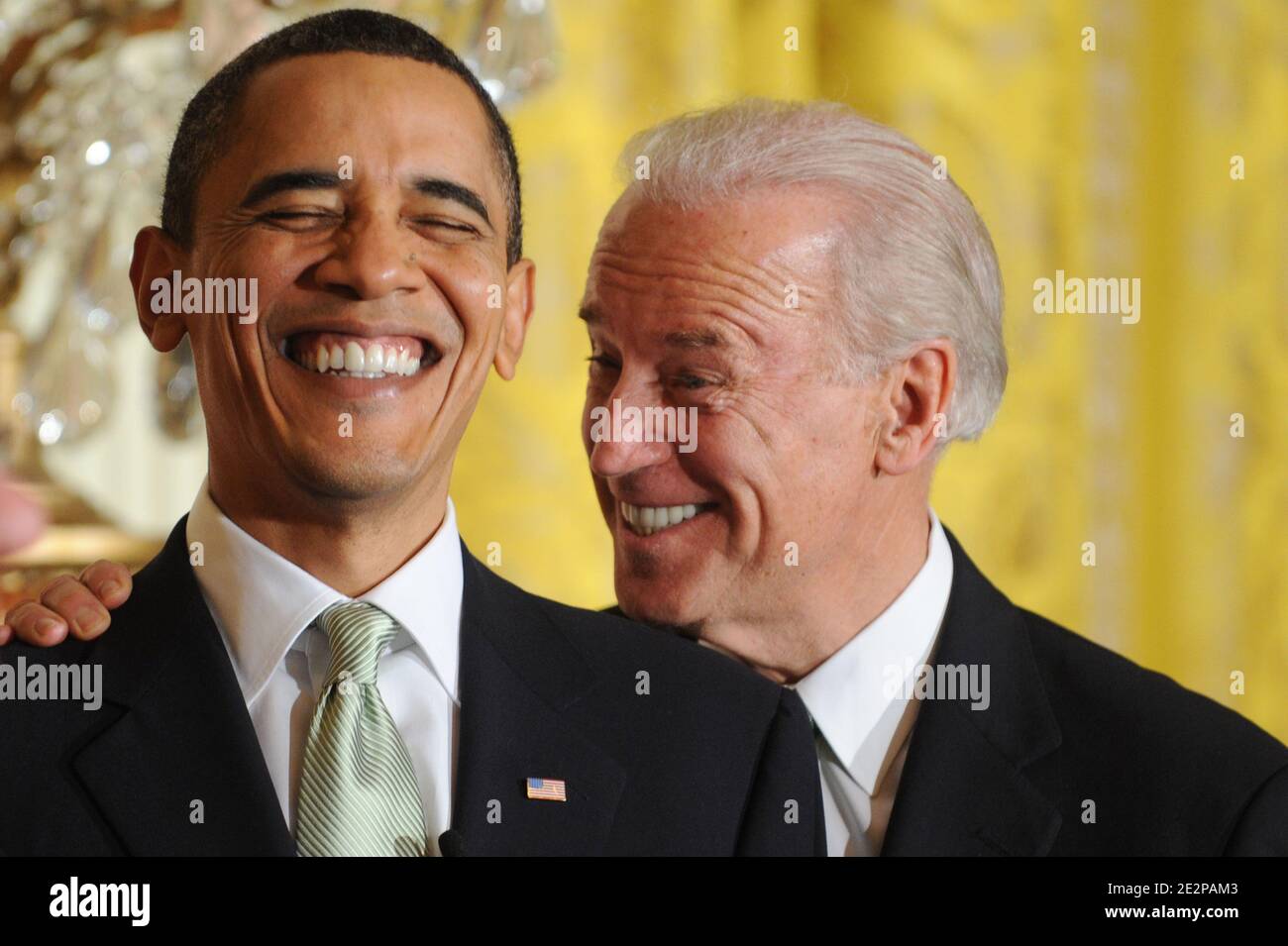 US President Barack Obama (L) and US Vice President Joe Biden (R) share a light moment during the annual St. Patrick's Day Reception in the East Room of the White House, in Washington DC, USA, on March 17, 2010. President Obama and the Prime Minister (Taoiseach) of Ireland Brian Cowen delivered remarks and participated in a traditional Shamrock ceremony. Photo by Michael Reynolds/Pool/ABACAPRESS.COM Stock Photo