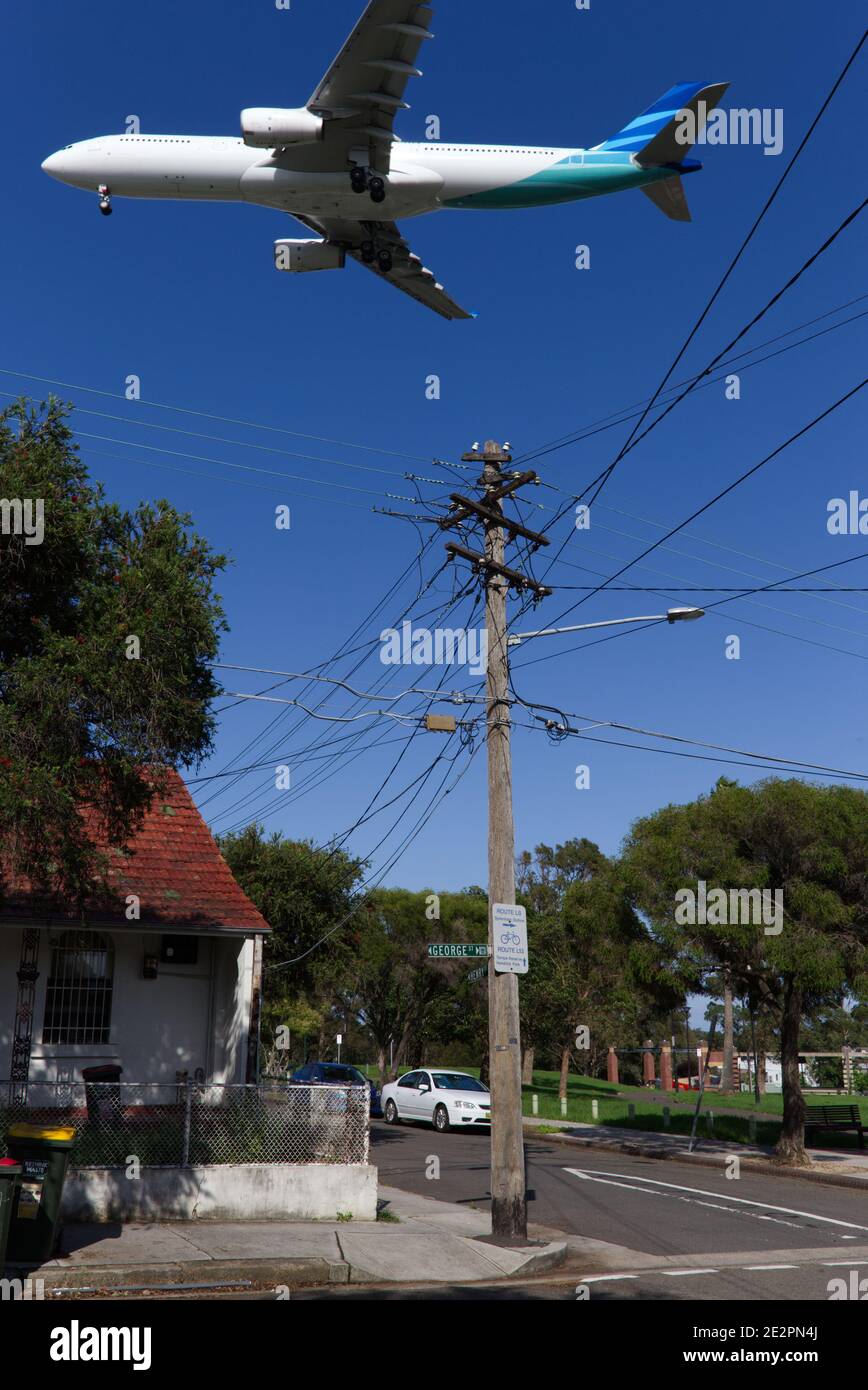 In the flight path at Sydenham with aircraft arriving to land at Sydney New South Wales Australia Stock Photo