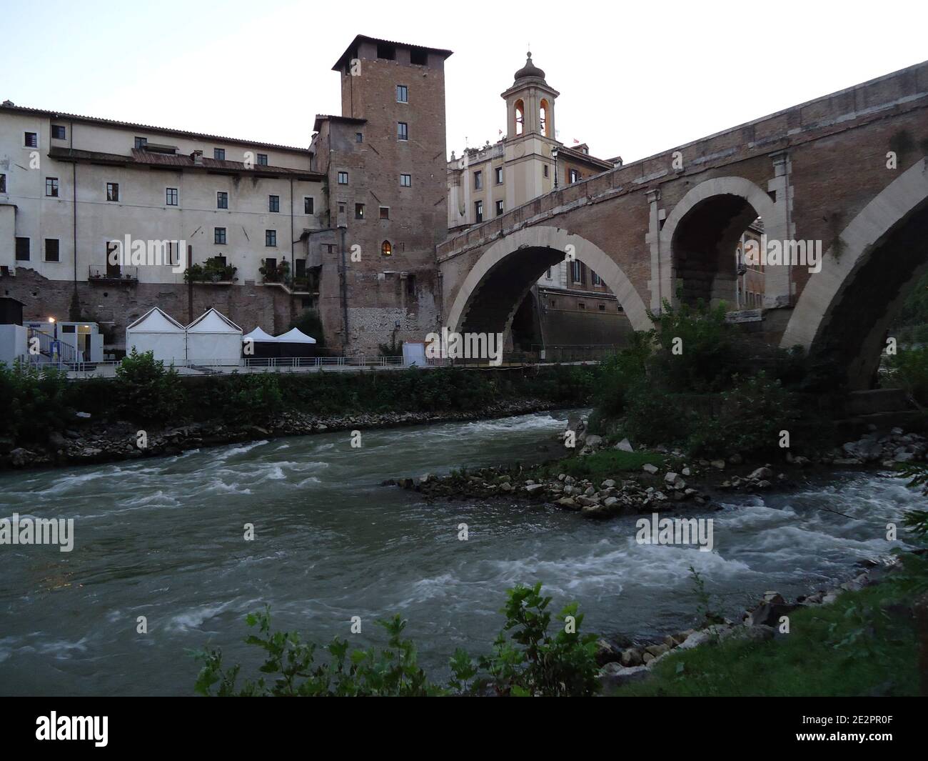 Hidden bridge over the Reno river in the heart of Rome Stock Photo