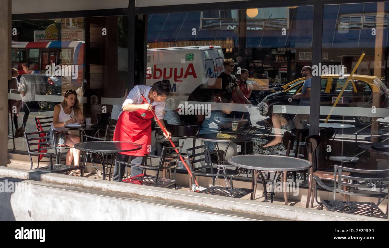 City reflections in a Starbucks window, Buenos Aires, Argentina Stock Photo