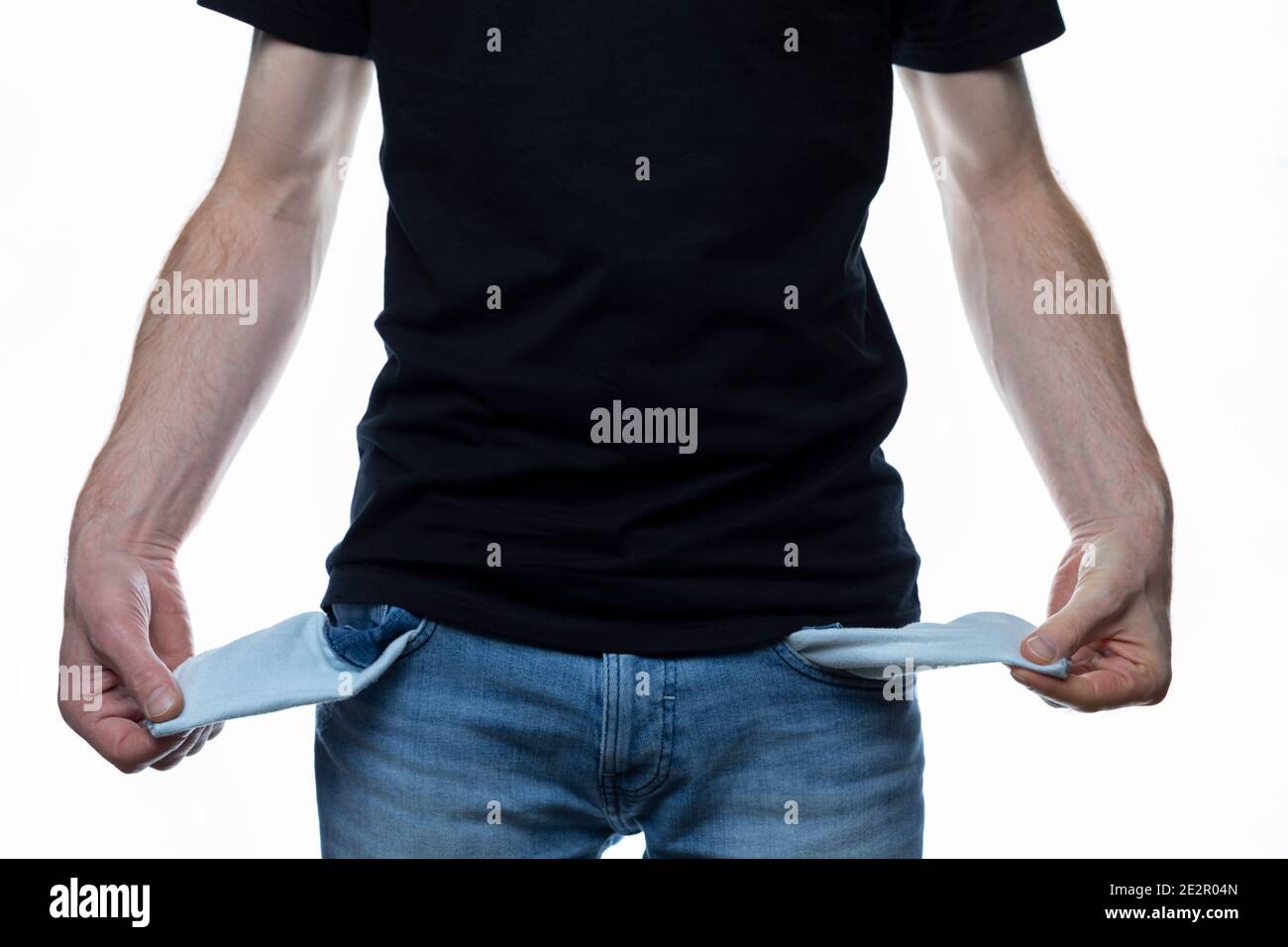 a poor man shows his empty Pockets with no money inside these Stock