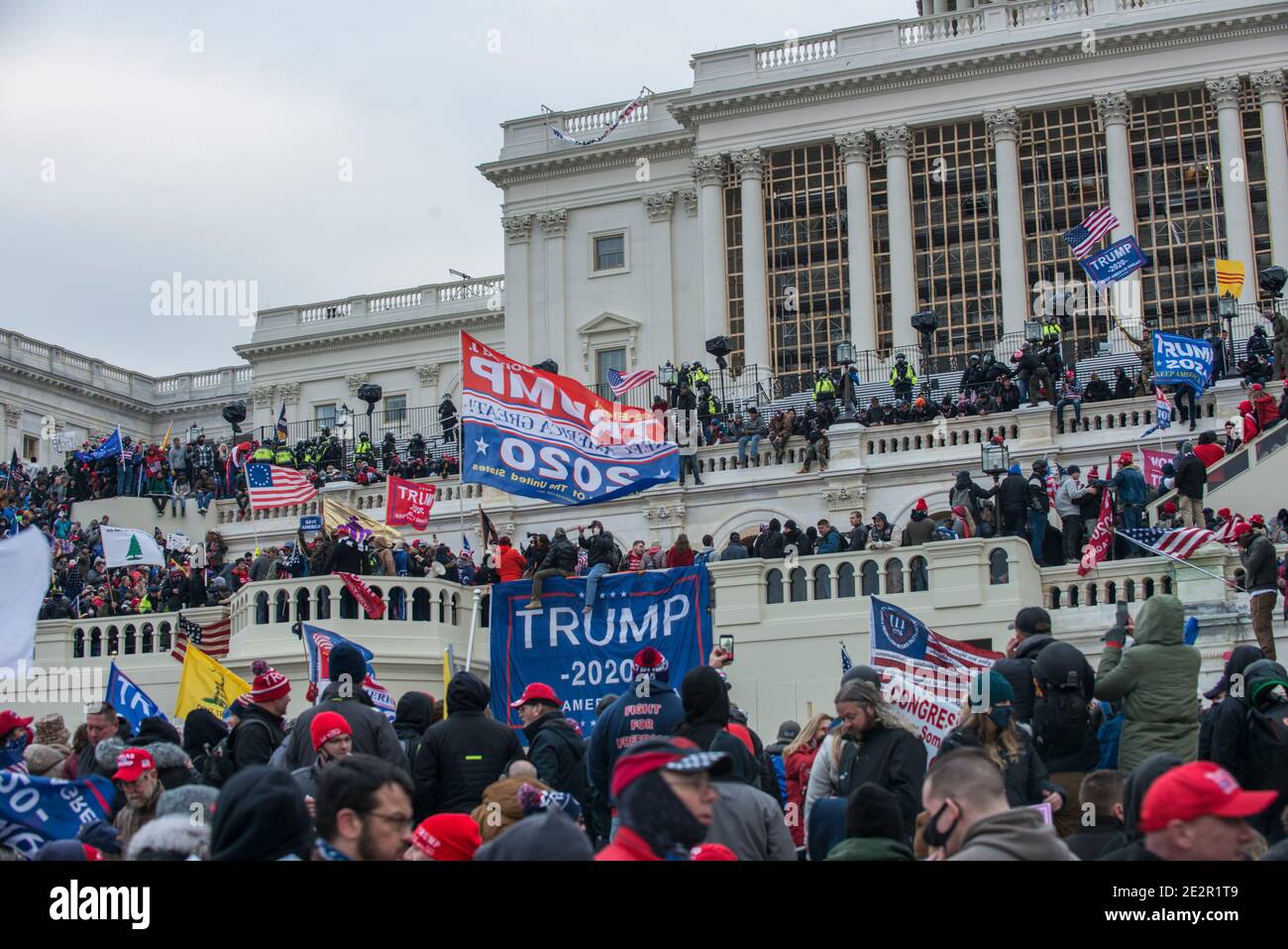 January 6th 2021. Large Crowds of Protesters at Capitol Hill with Donald Trump 2020 flags. US Capitol Building, Washington DC.USA Stock Photo