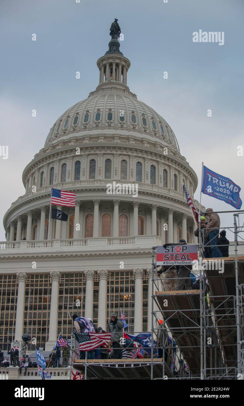 January 6th 2021.  Capitol Riot at US Capitol  with Donald Trump 2020 flags. US Capitol Building, Washington DC.USA Stock Photo