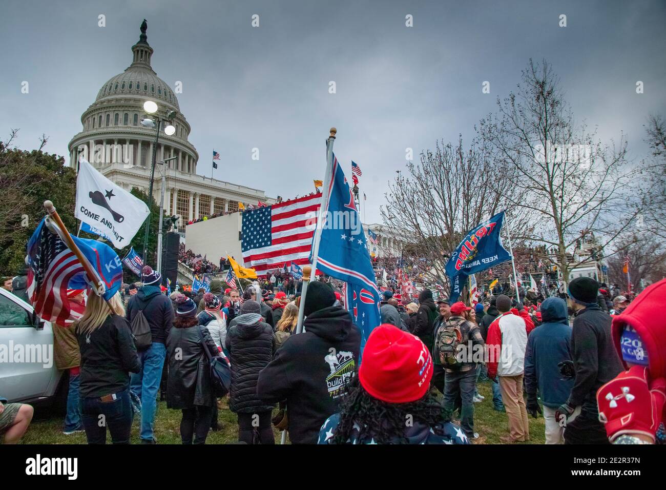 January 6th 2021. Large Crowds of Protesters at Capitol Hill with Donald Trump 2020 flags. US Capitol Building, Washington DC.USA Stock Photo