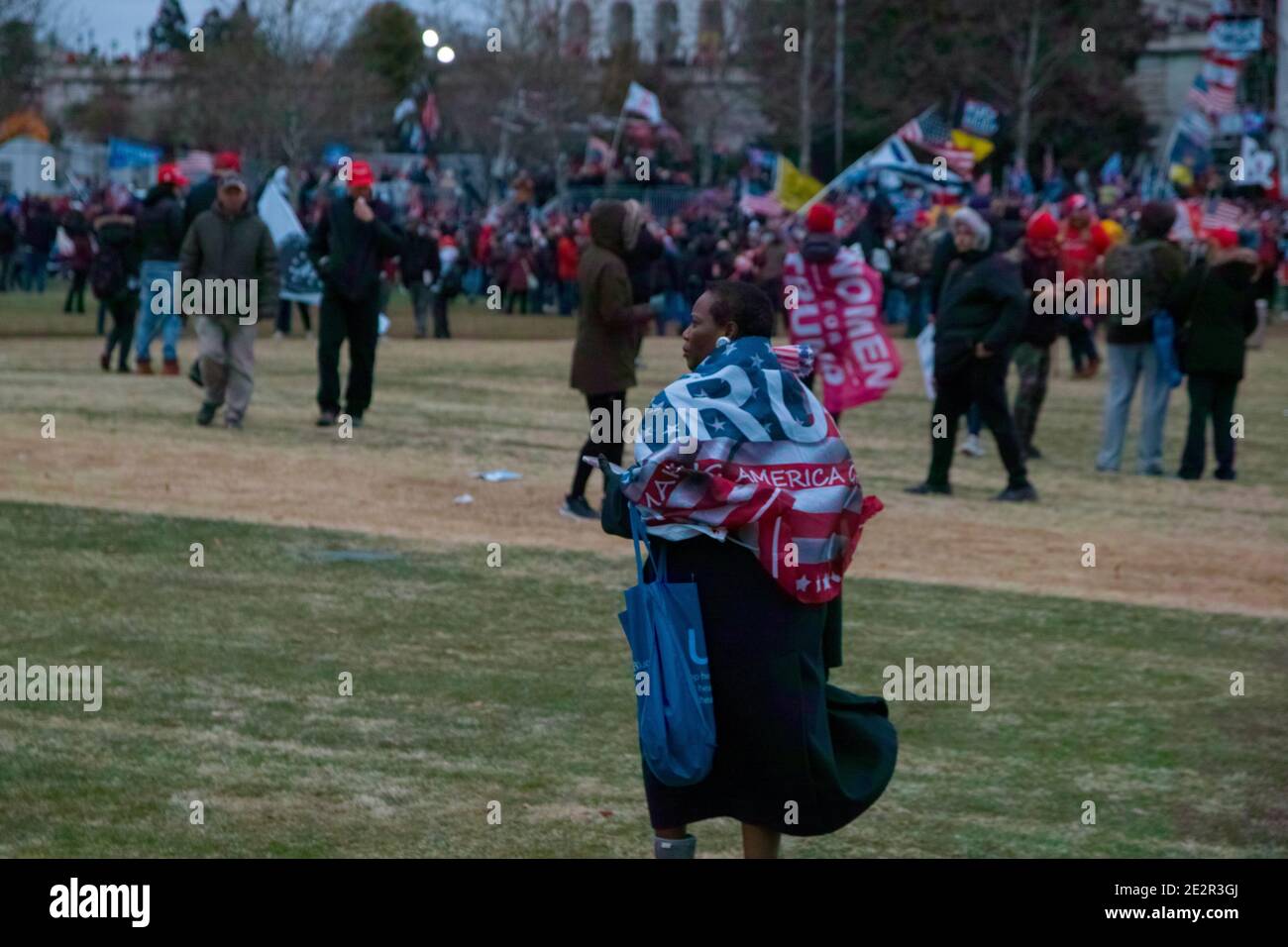January 6th 2021.Black woman with Trump flag at US Capitol. Riots at US Capitol , Washington DC.USA Stock Photo