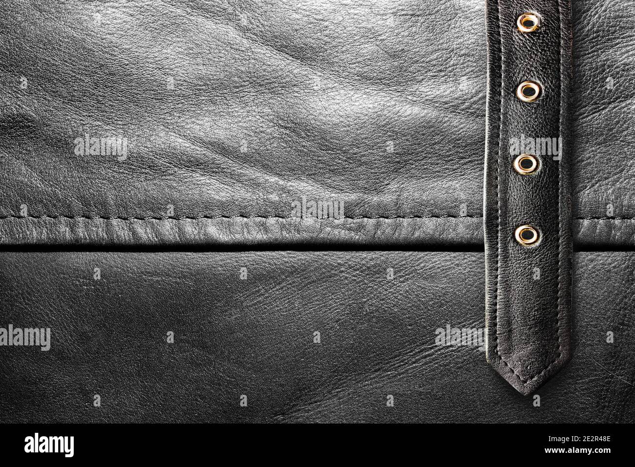 Background photo of a black leather texture with belt strap Stock Photo ...