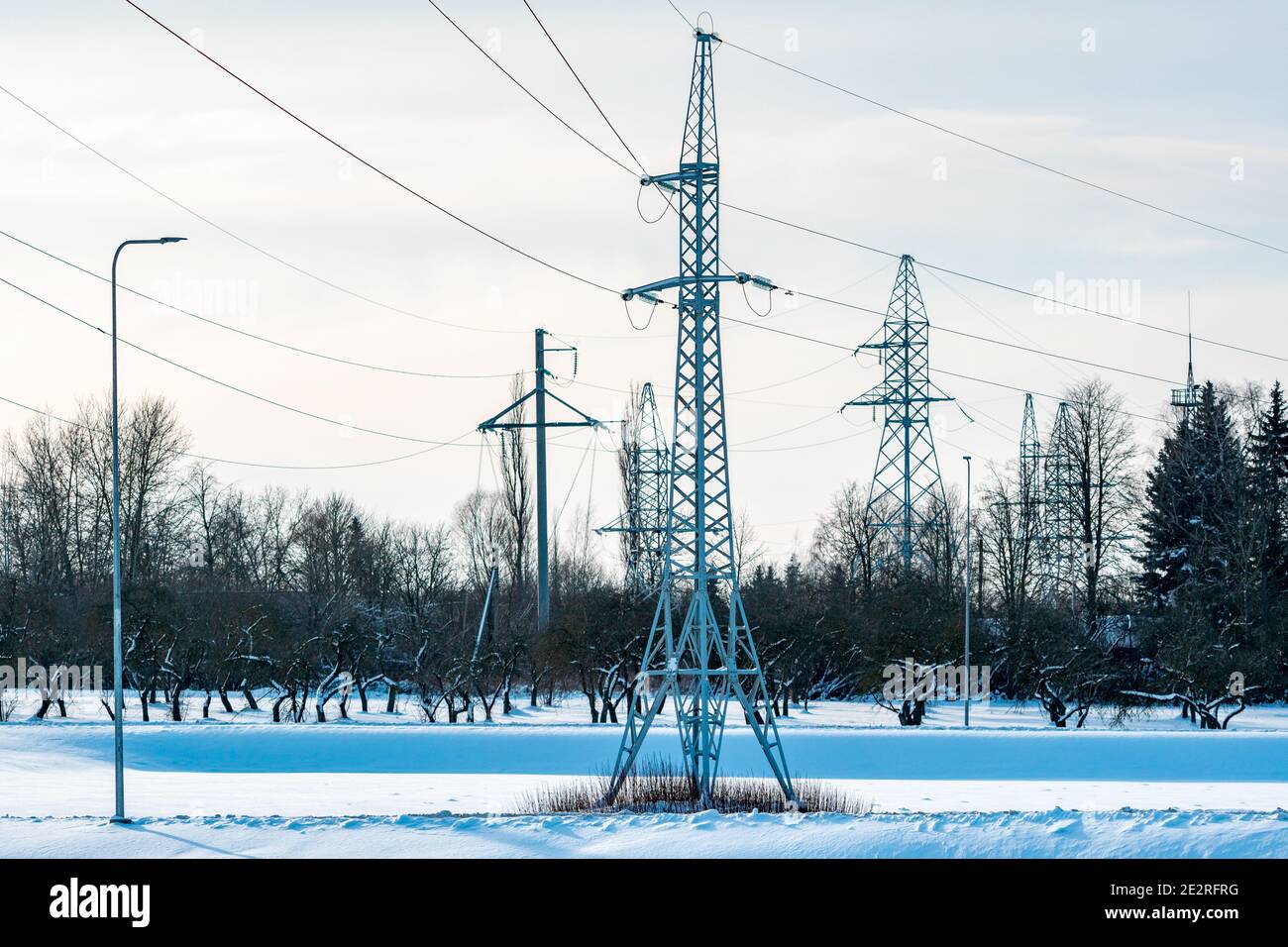 High voltage power lines in the winter. Winter landscape Stock Photo ...