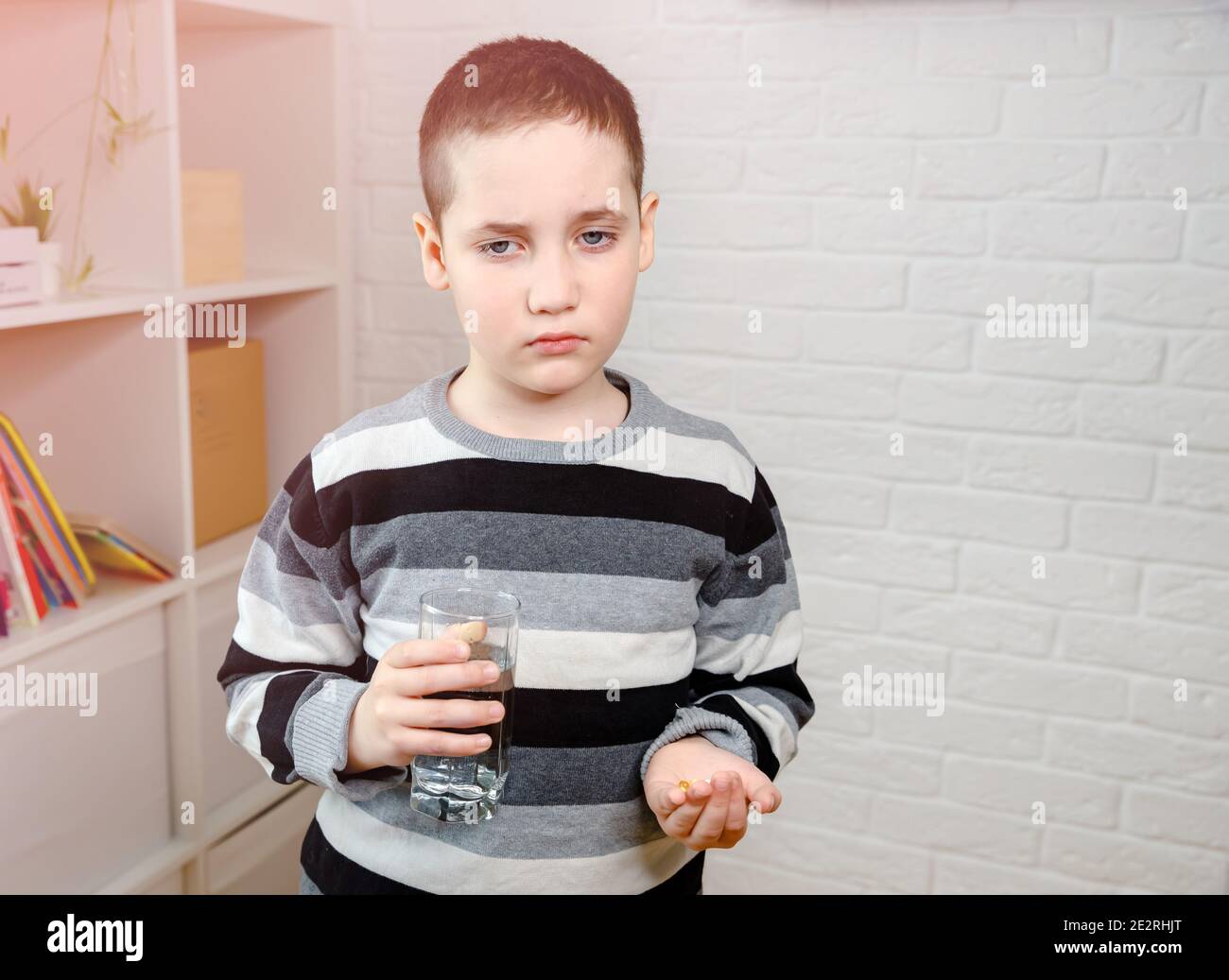 Cute child refuses to take medication being offered Stock Photo Alamy