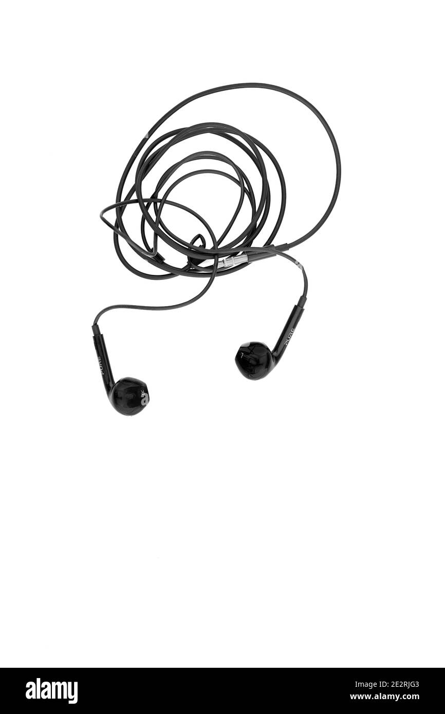 Pair of black earbuds or earphones. Stock Photo