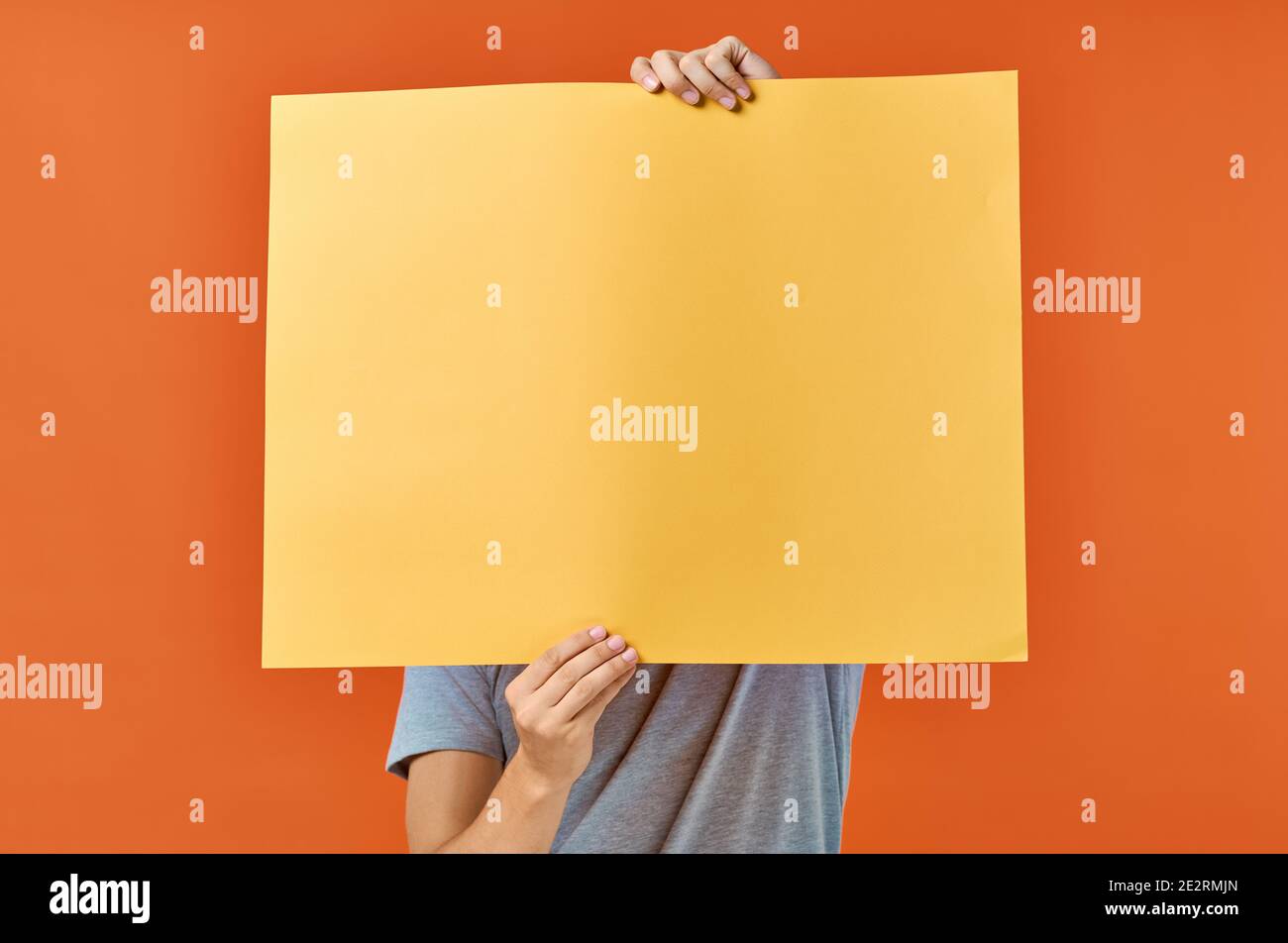 marketing poster orange background man in the background cropped view