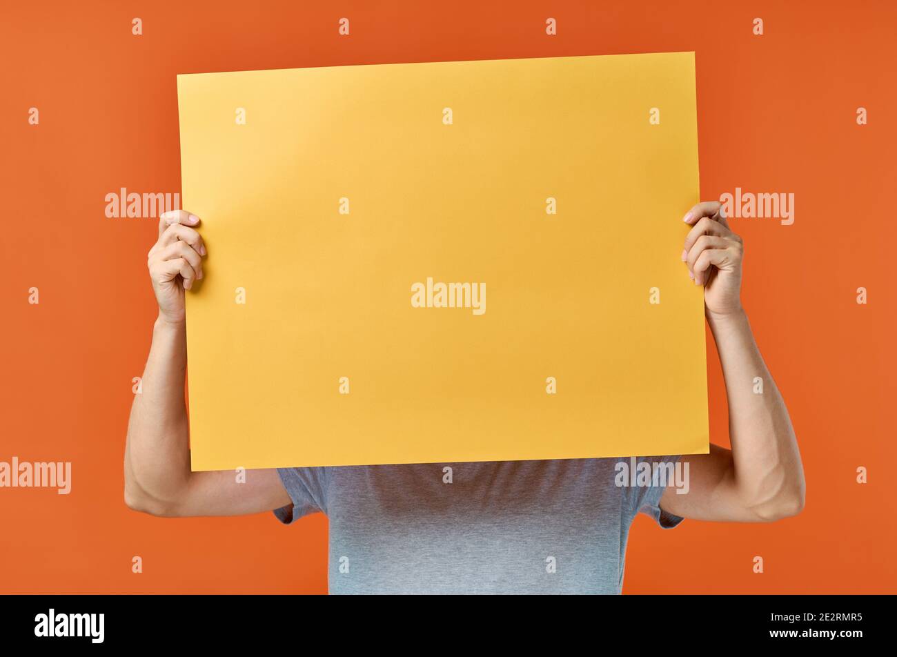 marketing poster orange background man in the background cropped view