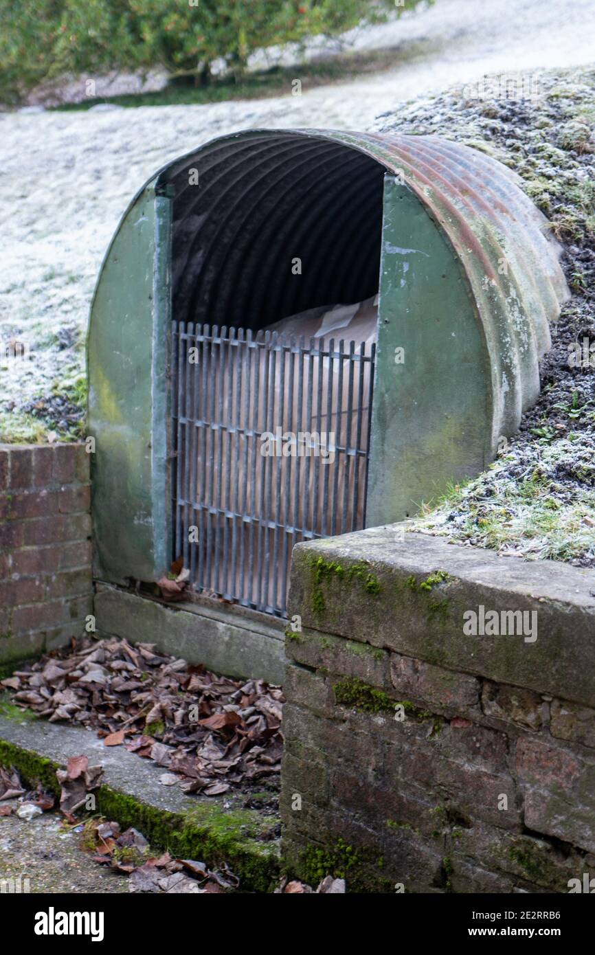 Abandoned Anderson shelter at the home of John Lewis, the founder of the general store in Hampshire. Stock Photo