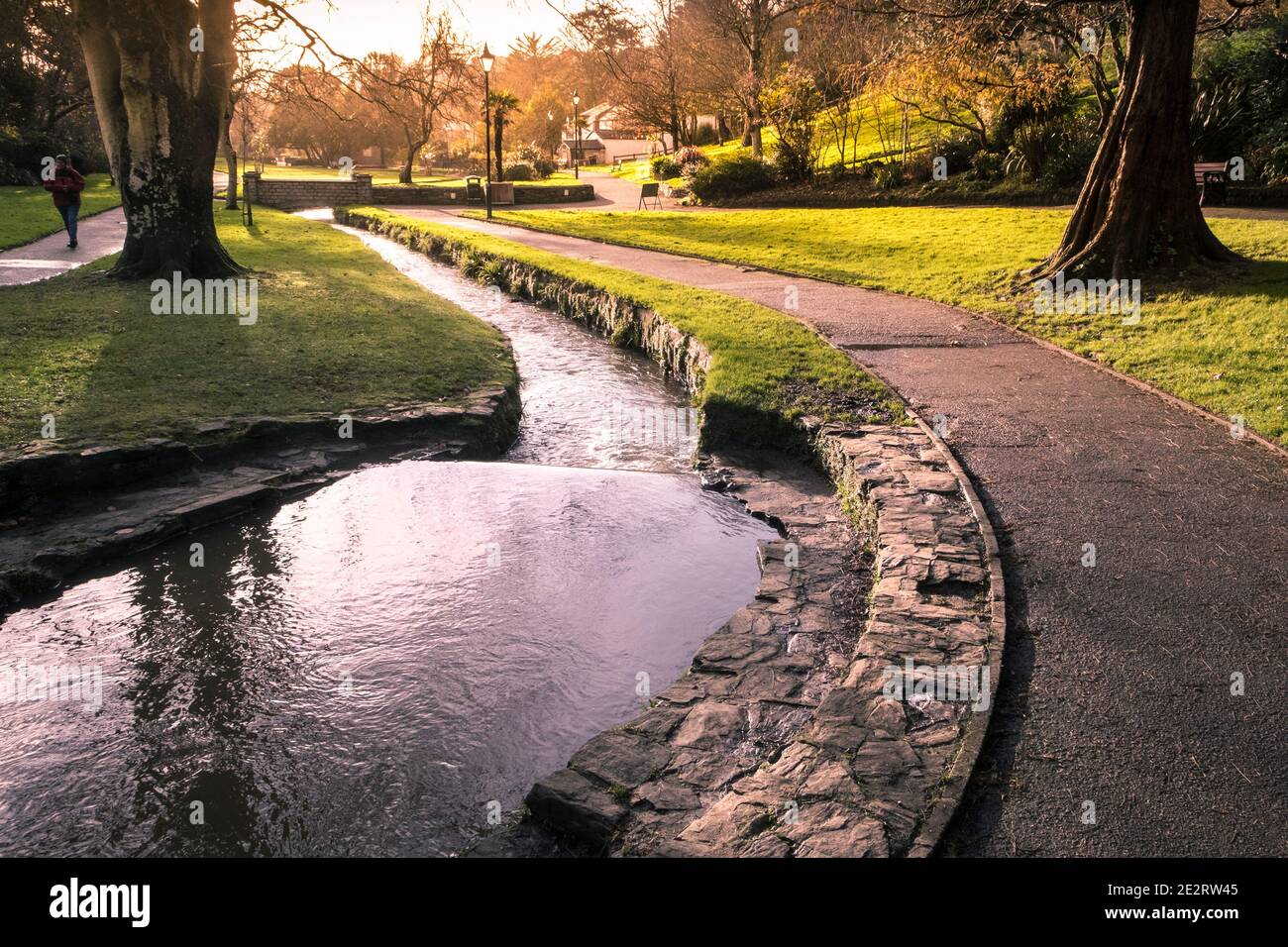 Early morning sunlight in Trenance Gardens in Newquay in Cornwall. Stock Photo
