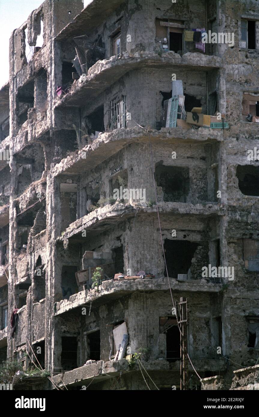 18th September 1993 After 15 years of civil war, life goes on in a battle-scarred building in Beirut. Stock Photo