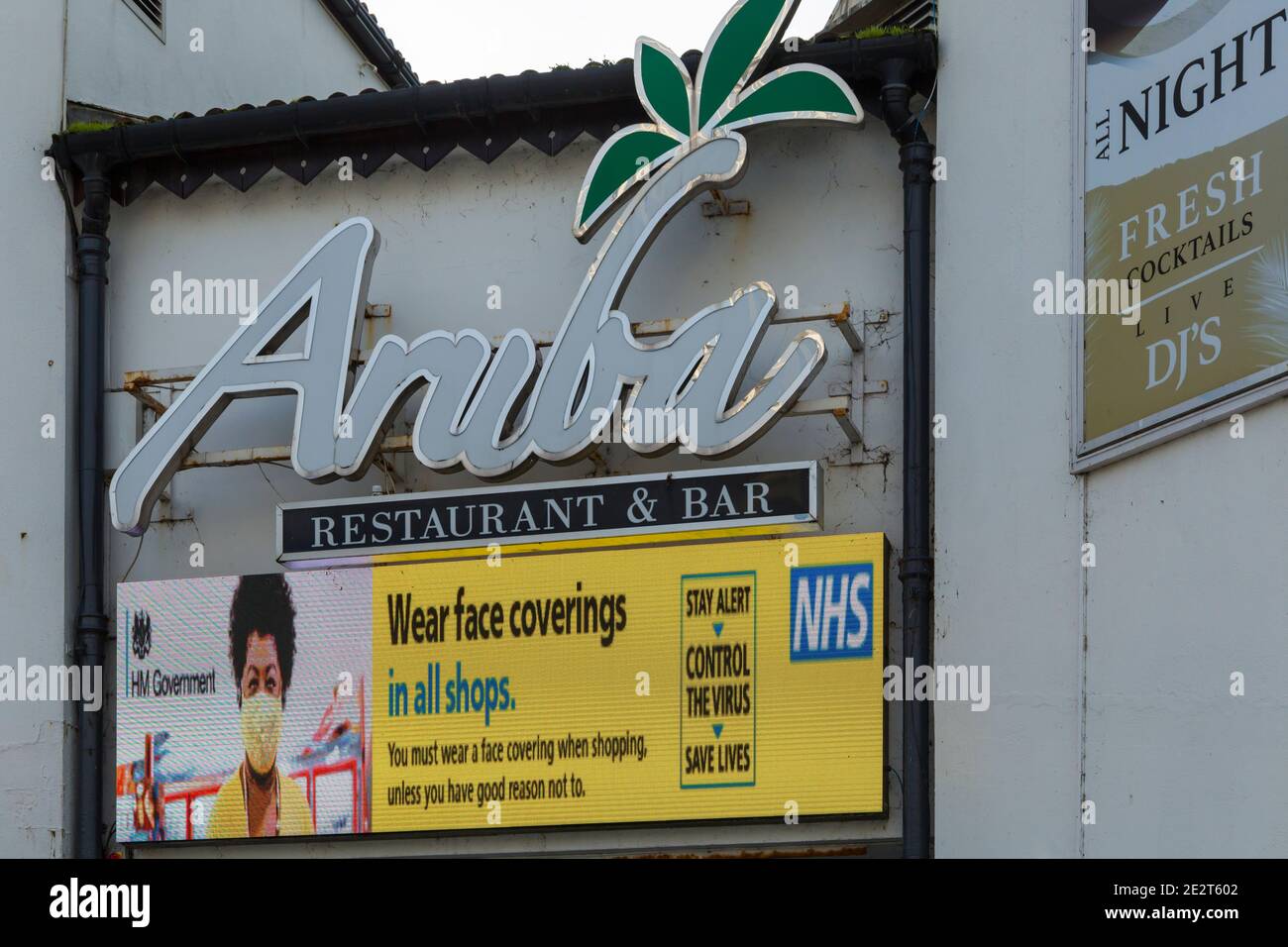 Bournemouth, Dorset UK. 15th January 2021. Signs at Pier Approach, Bournemouth reminding people to wear face coverings in all shops, stay alert, control the virus, save lives during Lockdown 3 of the Coronavirus Covid 19 pandemic.  Credit: Carolyn Jenkins/Alamy Live News Stock Photo