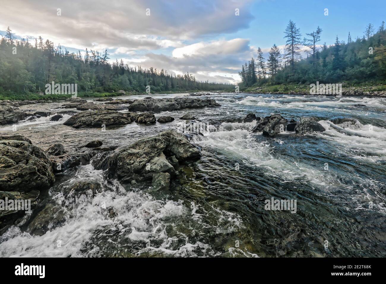 A rapid on the north river. Landscape with white water on a rapid. Stock Photo