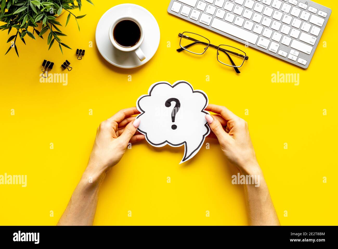 Question mark on table - solution concept. Top view Stock Photo - Alamy