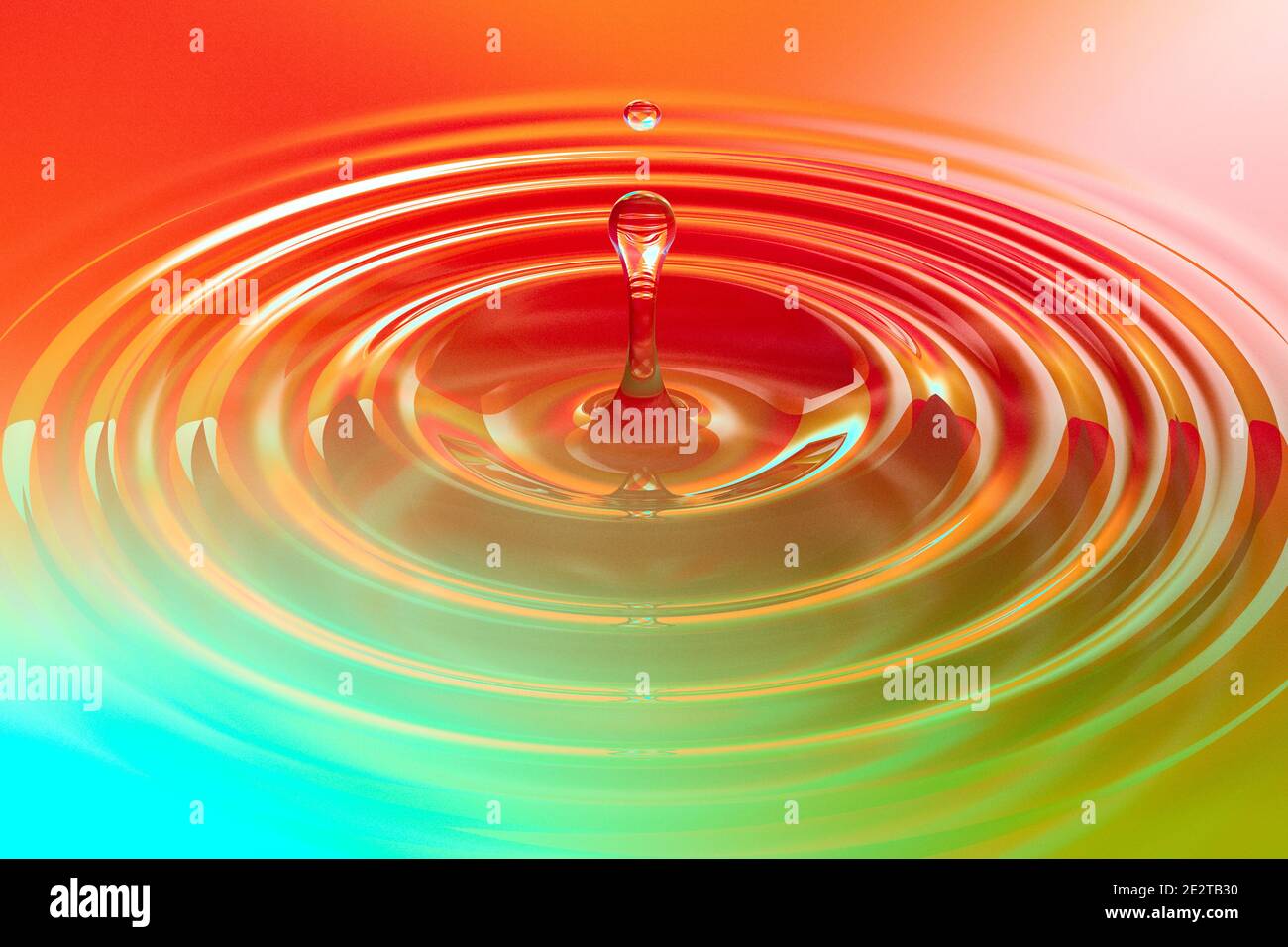 Colorful liquid drop or paint drop falling on color surface. Rainbow