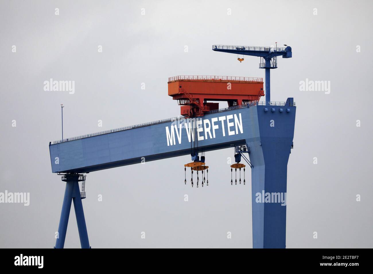 15 January 2021, Mecklenburg-Western Pomerania, Warnemünde: On the gantry crane of the Warnemünde shipyard of the MV shipyards is the lettering 'MV Werften'. Photo: Bernd Wüstneck/dpa-Zentralbild/dpa Stock Photo