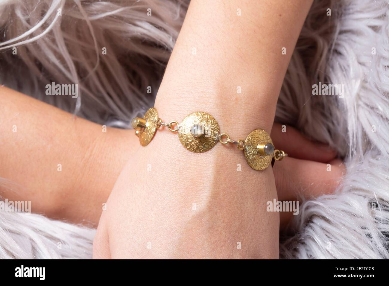 Wearing bracelet stones hi-res stock photography and images - Alamy