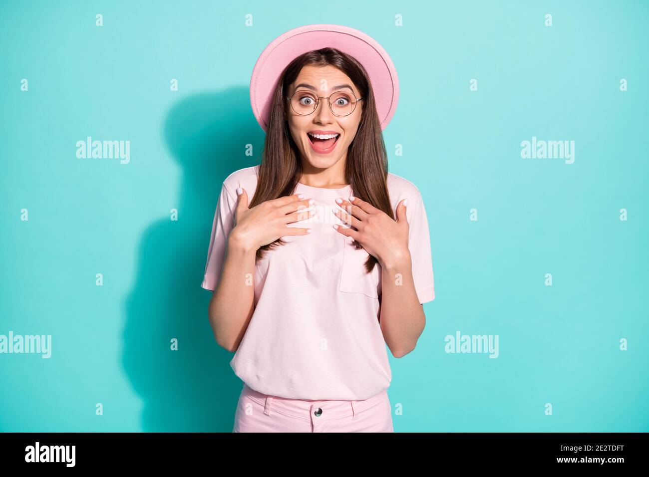 Photo of astonished young girl point hands on herself scream isolated ...