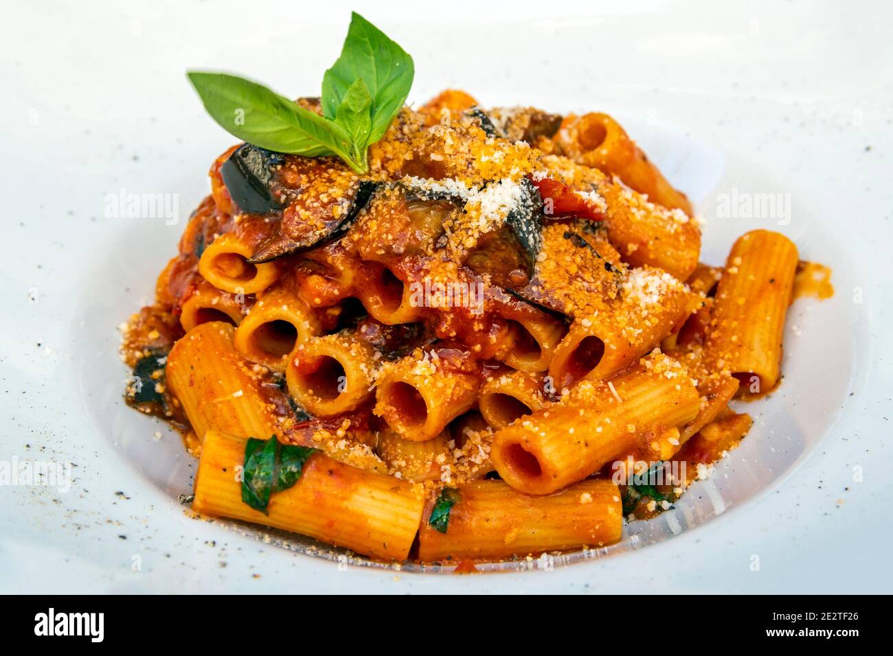 Penne alla norma pasta dish served in a restaurant in Catania, Sicily, Italy Stock Photo