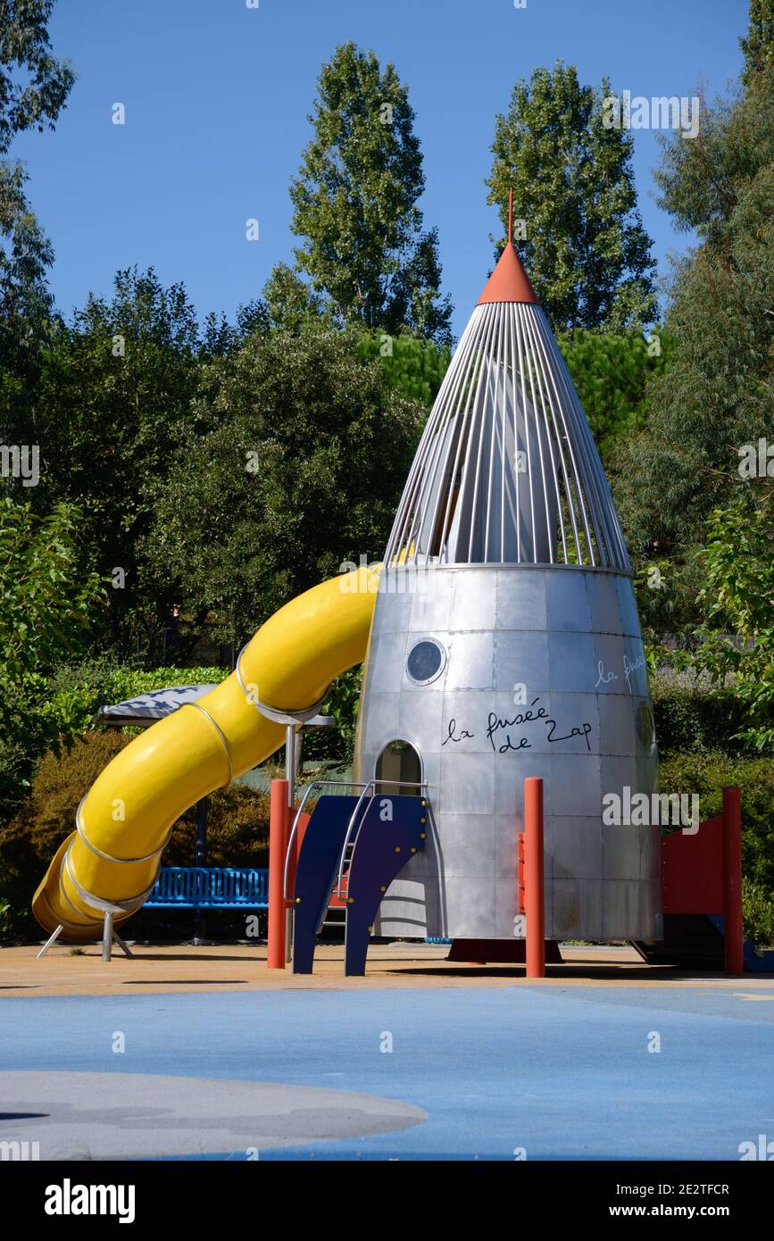Rocket-Shaped Slide in Space-Themed Children's Playground at Cité de l'Espace Space or Spaceflight Theme Park Toulouse France Stock Photo