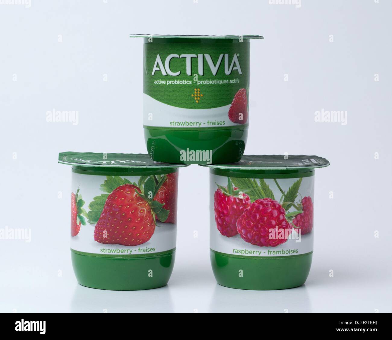 Pleasant Valley, Canada - January 14, 2021: Activia yogurt pots on neutral background. Activia is a brand of yogurt owned by the Groupe Danon corporat Stock Photo